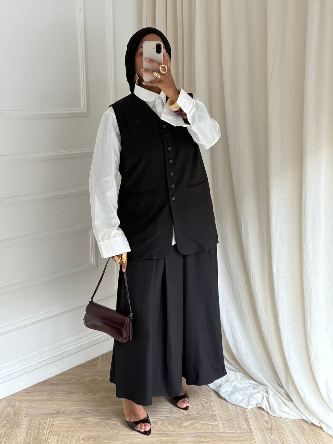 VESTE SANS MANCHES CAS NOIR